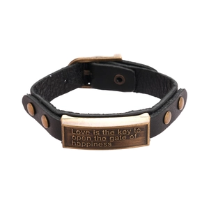 Vintage black leather bracelet with rectangular engraved metal plate and punk rivets