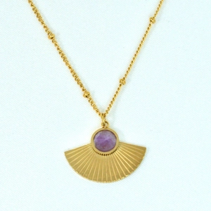 Close-up of fan-shaped purple amethyst pendant on 14K gold plated beaded chain
