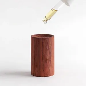 Diffuseur d'huiles essentielles en bois minimaliste avec grain naturel et pipette