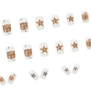 Short square press-on nails featuring cute cat patterns and brown star gradient designs