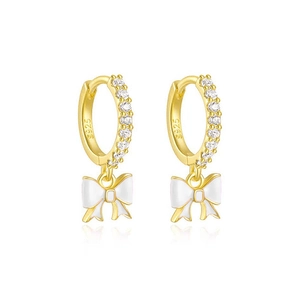 Detail of S925 sterling silver bow earrings with white enamel and sparkling zircon stones