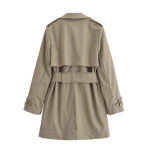 Detail view of khaki trench coat back featuring rain shield and adjustable waist belt