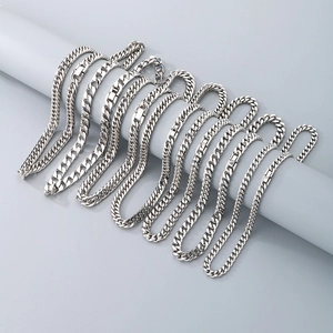 Polished silver stainless steel Cuban link chains in various widths for men