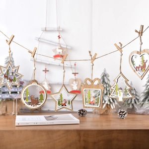 Hanging wooden Christmas ornaments with laser-cut star and tree designs in Nordic style