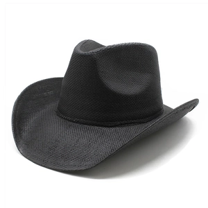 Close-up of black woven straw cowboy hat featuring fine texture and curved brim
