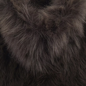 Macro detail of high-shine deep coffee faux fur texture with lush soft plush fibers