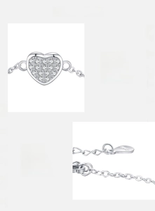 Macro detail of S925 sterling silver heart bracelet with sparkling zircon stones