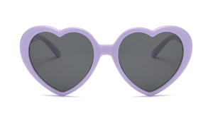Detail of purple heart-shaped sunglasses with dark grey lenses and smooth plastic frame