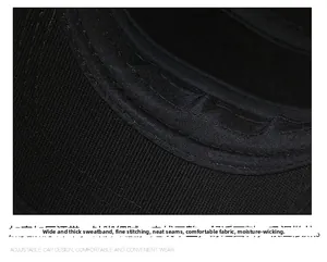 Detail of widened thickened sweatband on black winter flat cap with reinforced stitching