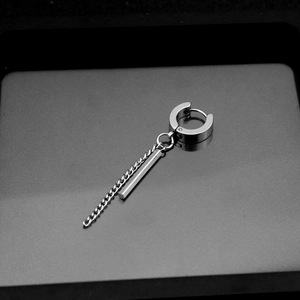 Detail shot of silver titanium steel tassel earrings with link chain and rectangular pendant