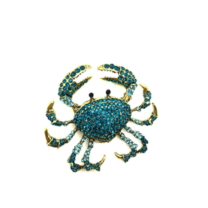 Broche crabe dorée de luxe avec strass bleus pour accessoires de costume chic