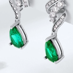 Elegant S925 silver drop earrings with pear-cut emerald gemstones and pave accents
