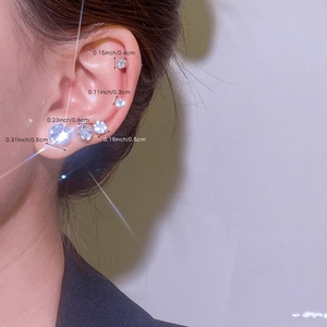Detailed comparison of five zircon stud sizes from 3mm to 8mm on the ear