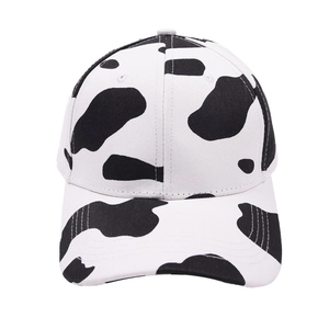 Classic cow print baseball cap with curved brim and adjustable strap for outdoor sun protection