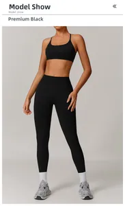 Detail of premium black seamless yoga set featuring U-neck sports bra and high-waisted leggings