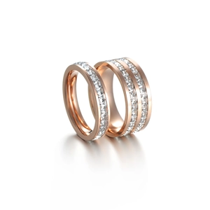 Macro shot of rose gold titanium steel ring set with square princess cut zircon stones