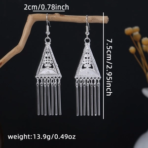 Detail view of silver hollow triangle fringe earrings with size and weight dimensions