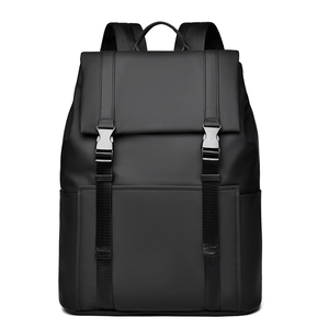 Minimalist black waterproof business laptop backpack with matte finish and dual buckles