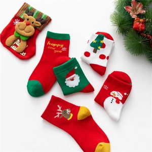 5-pack cartoon Christmas socks set with Santa, elk, and snowman patterns on white background