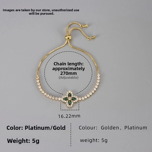 Detail view of adjustable clover bracelet with green marquise gems and white zircons