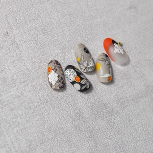 Detailed close-up of 5 relief nail stickers with traditional Chinese ink flower patterns