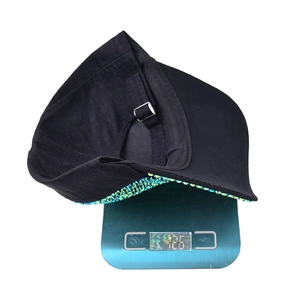 Black baseball cap with glitter sequins weighing 126g on a digital scale tool