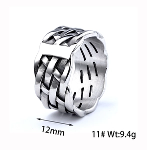 Detailed macro view showing the 12mm wide woven texture on this stainless steel ring