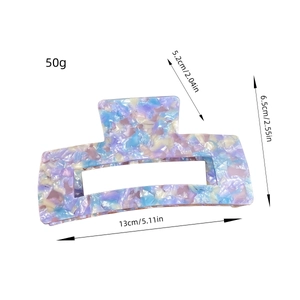 Classic oversized acetate hair claw clip with purple marble texture and dimensions