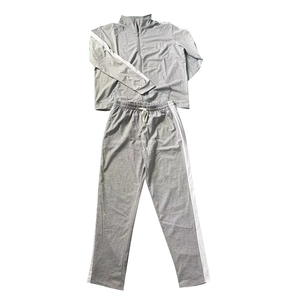 Detail view of gray zip-up sports set with stand collar and white side stripes