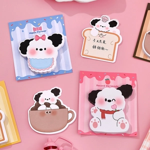 Cute cartoon dog sticky notes set with four creative shapes on a soft pink background