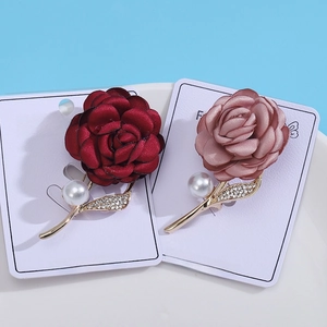 Elegant fabric rose brooches with rhinestones and pearls in deep red and pink purple colors