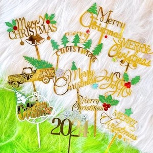Golden acrylic Christmas cake toppers with Merry Christmas and 2024 festive designs
