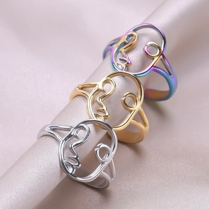 Minimalist stainless steel face outline rings in gold, silver and rainbow finishes