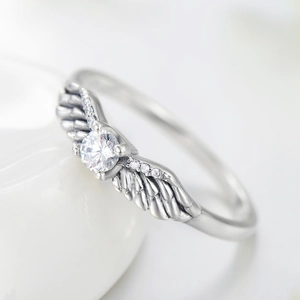 Vintage S925 sterling silver angel wing ring with round clear gemstone setting