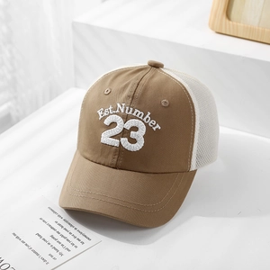 Close-up of kids mesh trucker hat with breathable mesh back and Number 23 embroidery