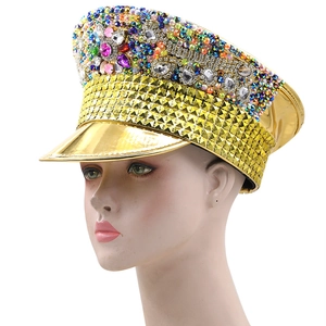 Close-up of gold disco captain hat with rhinestones and studs for party wear