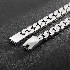 Polished silver stainless steel Cuban link bracelet with a secure square clasp closure