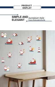 Detailed display of Christmas wall stickers with Santa and bears on a wood wall