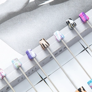 DIY plastic beaded pens with leopard and floral prints on a creative stationery magazine