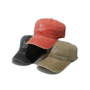 Washed cotton baseball cap set with puppy embroidery in rust, charcoal, and khaki