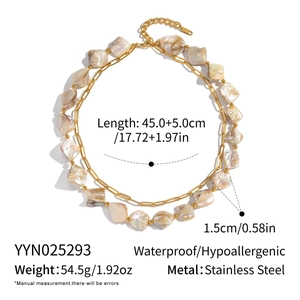 Detail of double-layer stainless steel necklace with irregular natural shell beads