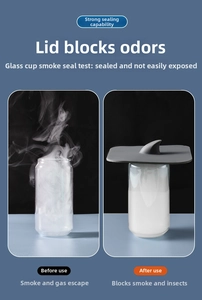 Silicone drain cover sealing test showing smoke containment on a clear glass cup