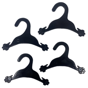 Set of 4 black plastic pet clothes hangers with unique cute paw shape design for dogs
