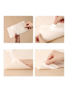 Four-step guide for using disposable pet placemats with adhesive strips and cat paw patterns