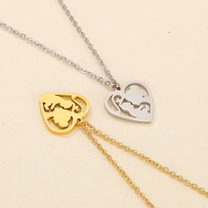 Detailed view of hollow heart mother and child pendant necklaces in gold and silver finish