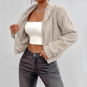 Detail of light grey cropped plush hoodie with vertical fleece texture and zipper