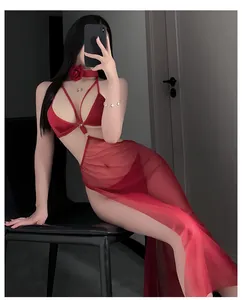 Detail of red lingerie set featuring halter neck, waist cut-outs and high side slit