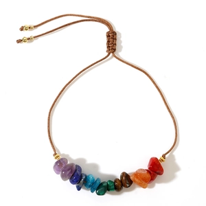 Handmade chakra bracelet with natural crushed gemstones and adjustable wax cord
