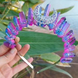 Detailed view of handmade crystal crown headband with pink and blue gradient stones