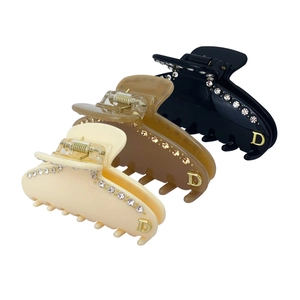 Set di 3 mollette per capelli in acetato crema, ambra e nero con strass e lettera D d'oro